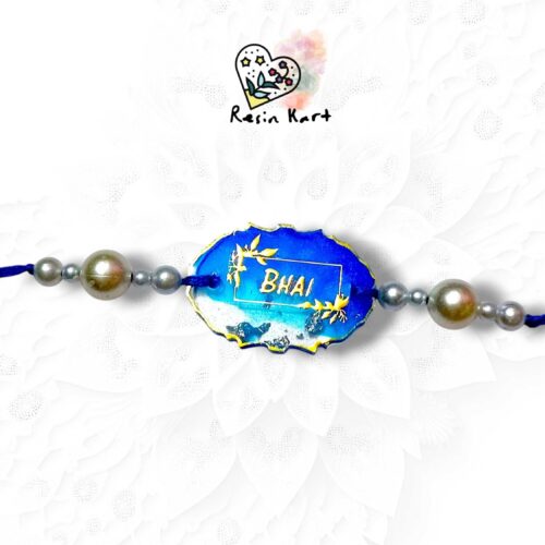 Sky Blue Resin Rakhi - Bhai Rakhi
